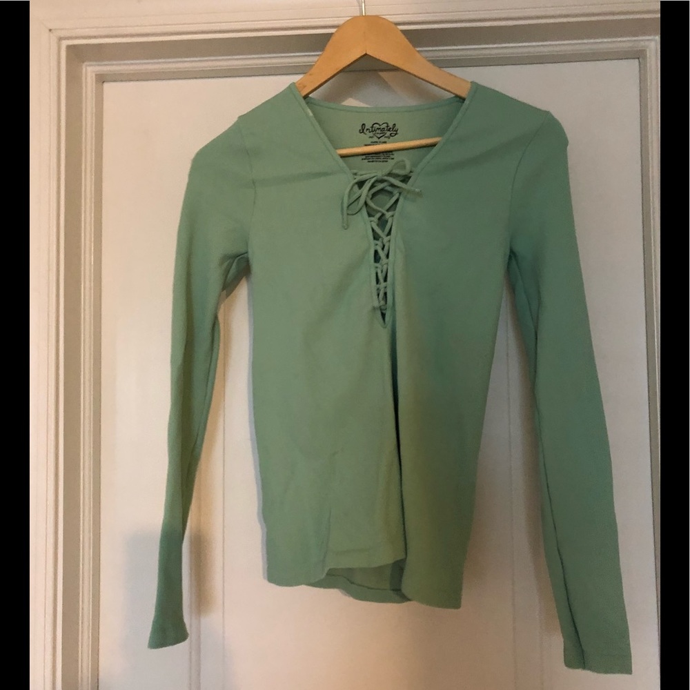 Fitted long sleeve top with sexy lace tie up